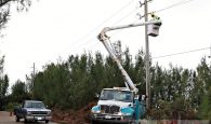 Utility workers were out restoring electricity, telephone, and water service across the island.