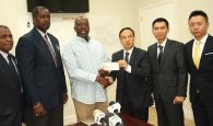 The Chinese Embassy donated $50,000 to the disaster relief fund, to assist with the Hurricane Matthew recovery programme. The presentation was made during a press conference at NEMA on Friday, October 14, 2016. Pictured from left are Jack Thompson, Permanent Secretary; Captain Stephen Russell, Director, NEMA; The Hon Shane Gibson, the Minister responsible for Hurricane Relief and Restoration; His Excellency Huang Qinguo, the Chinese Ambassador to The Bahamas; Wang Qingjun. Counsellor, Embassy of the People’s Republic of China, Bahamas; and Mr. Zhou Xiang, Second Secretary, Embassy of the People’s Republic of China, Bahamas.
(BIS Photo/Patrick Hanna)