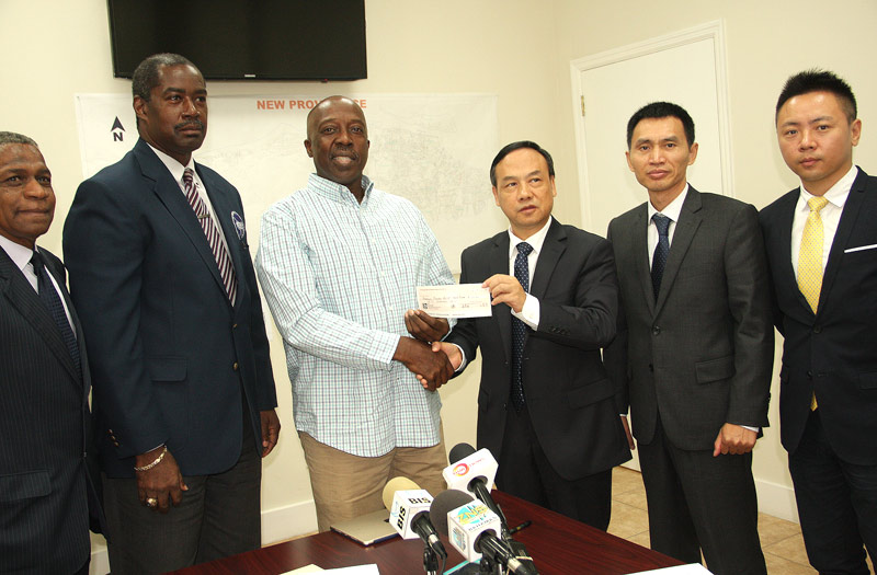 The Chinese Embassy donated $50,000 to the disaster relief fund, to assist with the Hurricane Matthew recovery programme. The presentation was made during a press conference at NEMA on Friday, October 14, 2016. Pictured from left are Jack Thompson, Permanent Secretary; Captain Stephen Russell, Director, NEMA; The Hon Shane Gibson, the Minister responsible for Hurricane Relief and Restoration; His Excellency Huang Qinguo, the Chinese Ambassador to The Bahamas; Wang Qingjun. Counsellor, Embassy of the People’s Republic of China, Bahamas; and Mr. Zhou Xiang, Second Secretary, Embassy of the People’s Republic of China, Bahamas. (BIS Photo/Patrick Hanna)