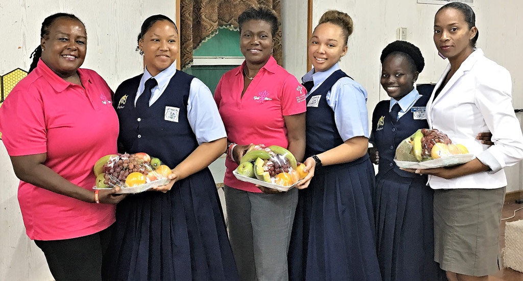 Morning judges stand with the Preston Albury High School Debate Team, which got the opportunity to present their arguments despite a forfeit by their competitors. (L-R) Jacquelyn Gibson, Tourism Manager; Tiara Jones, PHAHS Debator; Juanita Pinder, Rotary Past President and Business Owner; Hannah Ingraham, PHAHS Debator; Anthonya Miller, PHAHS Debator; Elizabeth Bryan, Managing Editor - The Eleutheran Newspaper. 