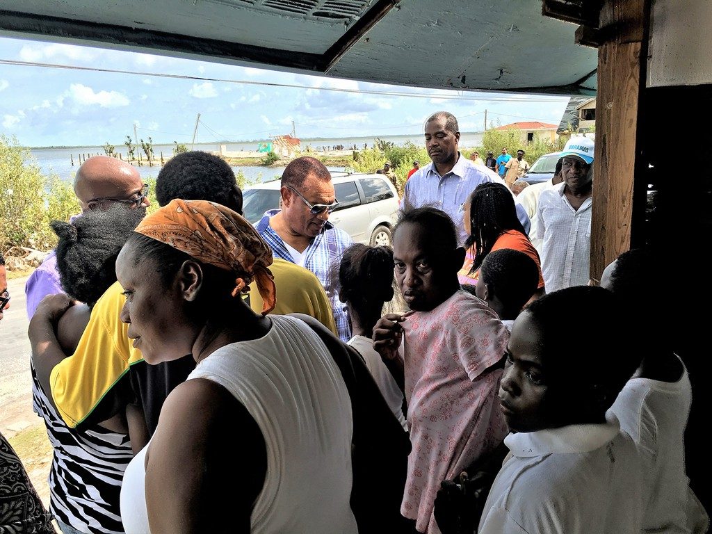 LOWE SOUND, North Andros - The Rt Hon Perry Christie, Prime Minister and Captain Stephen Russell, Director of the National Emergency Management Agency, NEMA, speak with residents in Lowe Sound, Andros during an assessment trip mobilized by NEMA, on Saturday, October 8, 2016 to Lowe Sound, Andros, one of the areas hardest hit by the Category 4 Hurricane Matthew. (PHOTO/NEMA) 