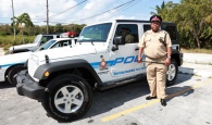 Supt. Wright standing next to one of three new Jeeps