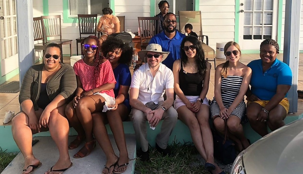 Members of the Rotaract Club of Eleuthera pose for a picture with visiting Rotaractors Alexandra, Areli and Franziska.