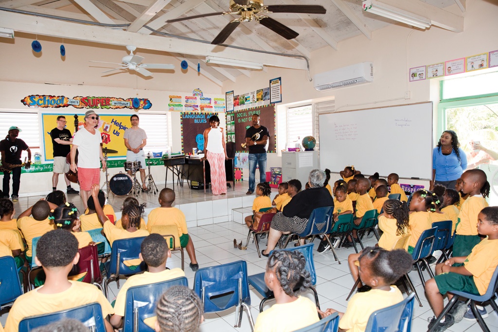 Jazz artists interacted with the children at the Governor’s Harbour Primary school, teaching them about instruments and vocals.