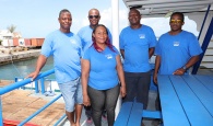 Captain Lucitas Greene (far left) with the crew of the new Bahamas Daybreak.