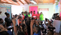 Students at Gregory Town Primary School welcome the Pineapple Fest Chairwoman and Ministry of Tourism representatives.