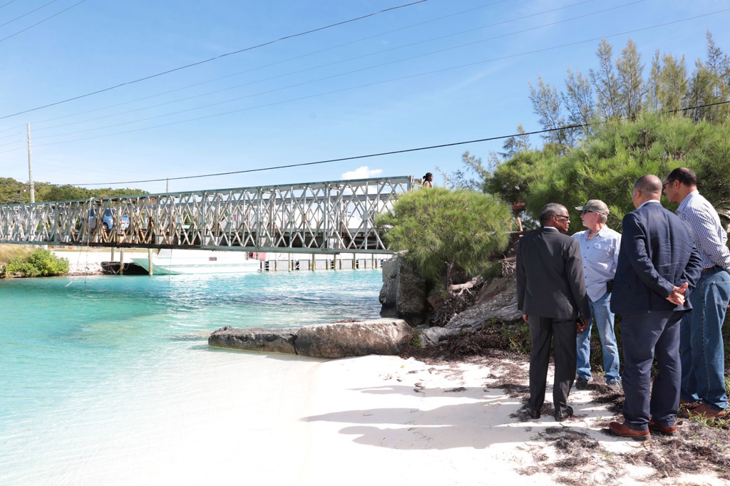 Chief Councillor, Robert Roberts, giving Minister Bannister and his colleagues with the Ministry of Public Works a tour of the deteriorated bridge in 2018.