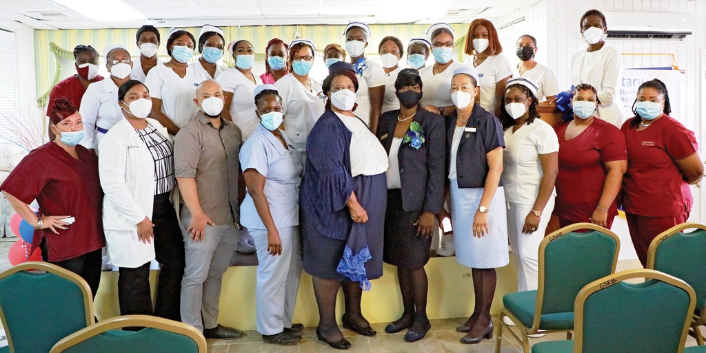 Nurse Monique Roberts-Cambridge (center right) stand with her colleagues serving in the medical profession throughout Eleuthera's community clinics.