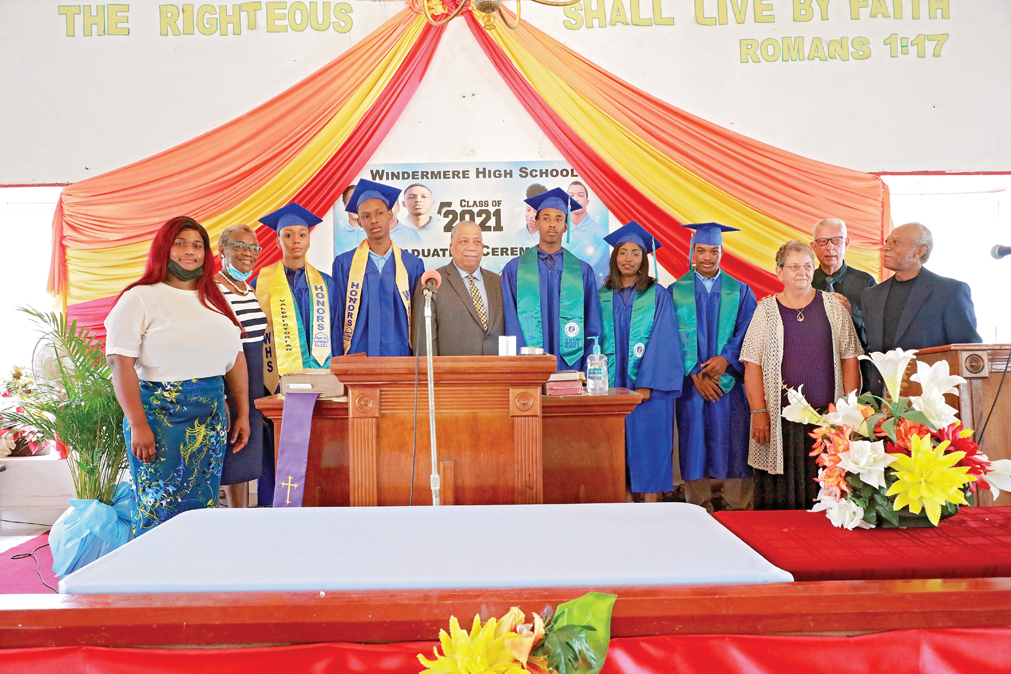 CEHS graduates stand with Principal Marie Galanis, and District Education officials, DSE Michael Culmer, DEO Fontella Knowles and DEO Andrea Carey.