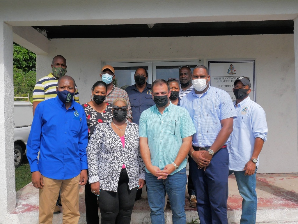 Minister Sweeting with staff at the Department of Fisheries and the BAMSI satellite office in Palmetto Point.