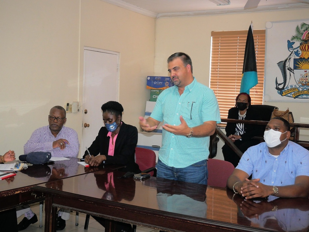 Minister Sweeting speaks to local government officials in Rock Sound, Eleuthera.