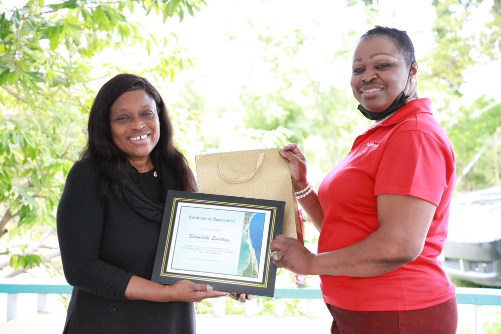 Bernadette Sweeting with Urban Renewal (left) singled out for her partnership with BahamaHost. She stands with Mrs. Glenda Johnson-Ingraham with the Ministry of Tourism.