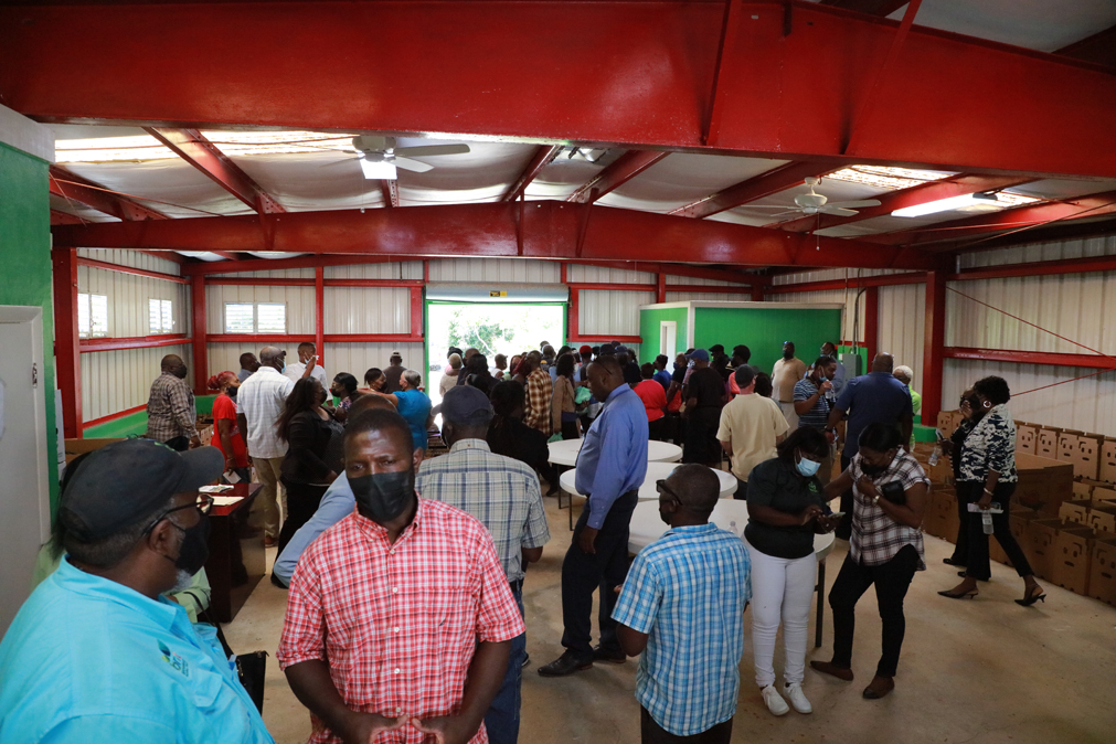 Following the reopening ceremony, members of the Eleuthera farming community toured the interior of the Packing House.