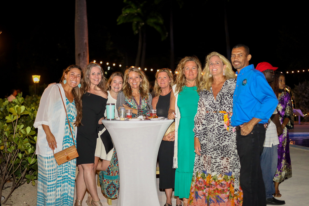 Right to Left: Shaun Ingraham, CEO and President, OEF & CTI & Lisa Scolatti Anderson President, Friends of HITS (Harbour Island Trade School) surrounded by supporters and friends
