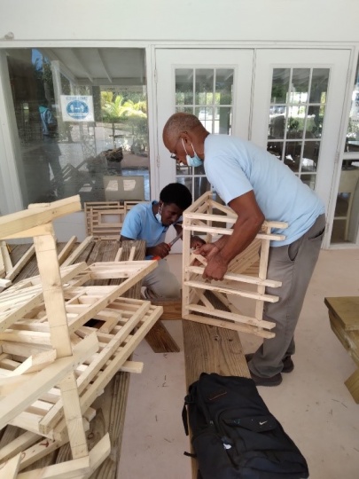 Carpentry students engaged in practical training.