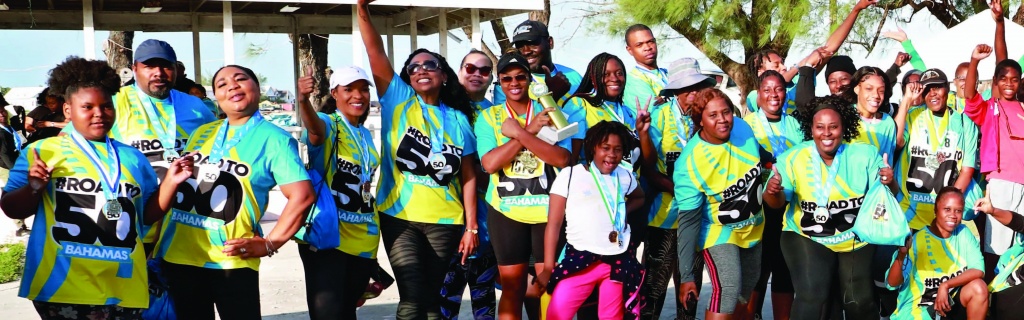 Early risers enthusiastic and full of energy at 6:00 a.m. ahead of their participation in the 'Road to 50' Race on Saturday morning, December 3rd, 2022 in Governor's Harbour - a national kickoff of the Bahamas' 50th Independence celebrations. Similar races took place in both North and South Eleuthera, and in every other island in The Bahamas.