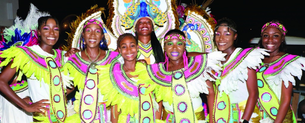Harbour Island All Stars junkanoo group's choreographed dancers arrayed in beautiful smiles.