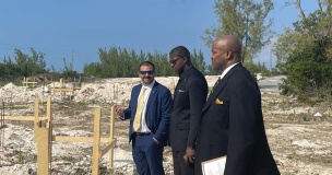 CSE MP the Hon. Clay Sweeting stands with the Hon. Zane Lightbourne and Hon. Vaughn P. Miller, as they view the start of construction on homes within the Ministry of Housing and Transport's new Ocean Hole Subdivision in Rock Sound, South Eleuthera, early in December 2022.