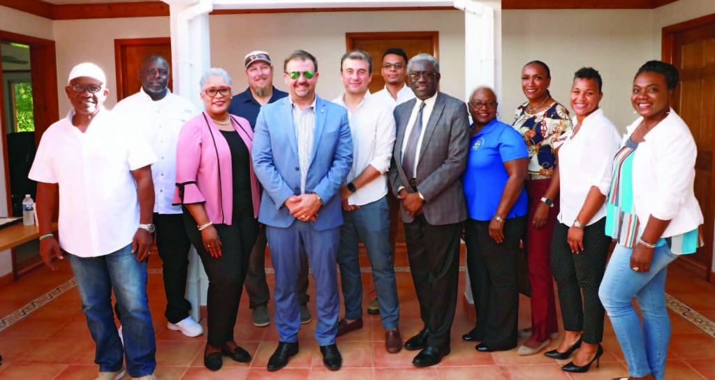 Managing Director of Cotton Bay Holdings Limited, Mr. Daniel Zuleta (center in white), met with MP Clay Sweeting (center left) and a cross-section of local stakeholders, to update on the status of the project and projected time lines.