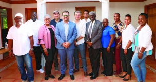 Managing Director of Cotton Bay Holdings Limited, Mr. Daniel Zuleta (center in white), met with MP Clay Sweeting (center left) and a cross-section of local stakeholders, to update on the status of the project and projected time lines.