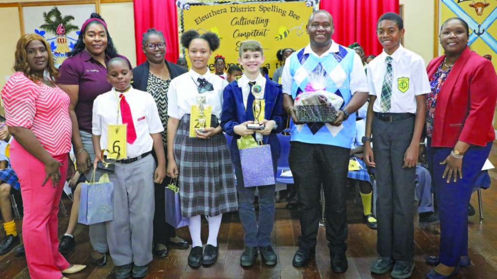 (L-R): Melinda Wallace, Constituency office; Coach Edgecombe; Third Place Winner, Xavier Ferguson of P.A. Gibson Primary; Coach Sterling Johnson; 2nd Place Winner, Syrai McHardy of North Eleuthera High School; 2023 District Spelling Bee Champion, Wes Underwood of Samuel Guy Pinder All Age School; Coach Bevil Clarke; former Eleuthera District Spelling Bee Champion, Sohan Bryan of Central Eleuthera High School, and Mrs. Fontella Knowles with the Ministry of Education's District Office.