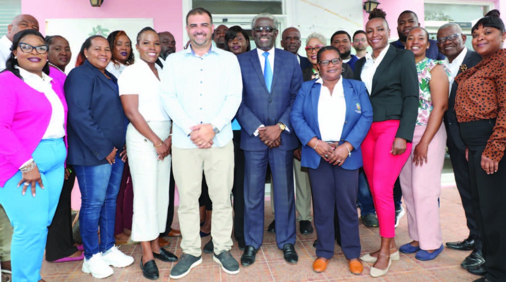 Minister Clay Sweeting along with officials from the Department of Local Government in New Providence, accompanied Turks and Caicos Island government representatives on a visit to Eleuthera. Here, the group is pictured in Rock Sound with the South Eleuthera District Council and Administrator Harvey Roberts.
