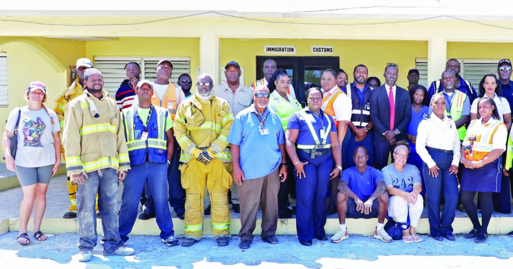 Standing for a group photo are the volunteers, employees, managers, emergency service personnel, as well as several residents caught in the action during the morning exercise at the Governor's Harbour airport on April 27th, 2023.