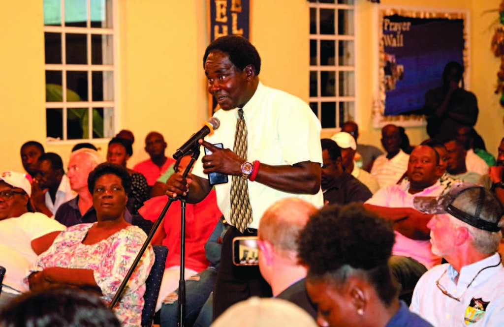 Members of the North Eleuthera community putting questions to the panel during the meeting. Questions in general centered on time lines, coming services, employment, the commonage and other concerns.