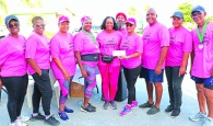 Solombra Ingraham (center), from women's empowerment organization 'I'm Every Woman' supported by her colleagues from the Links International Group back home in California, brought with her $7,000 in funds raised by the international groups to support the local Cancer Society Eleuthera Branch, which was presented to president Susan Culmer (center right) on Saturday morning (Oct. 28th, 2023) - in the presence of ECS members, volunteers and Fun-Run-Walk participants.