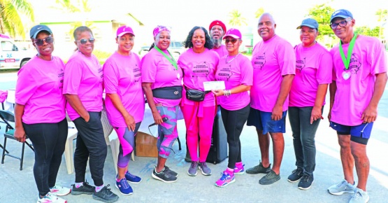 Solombra Ingraham (center), from women's empowerment organization 'I'm Every Woman' supported by her colleagues from the Links International Group back home in California, brought with her $7,000 in funds raised by the international groups to support the local Cancer Society Eleuthera Branch, which was presented to president Susan Culmer (center right) on Saturday morning (Oct. 28th, 2023) - in the presence of ECS members, volunteers and Fun-Run-Walk participants.