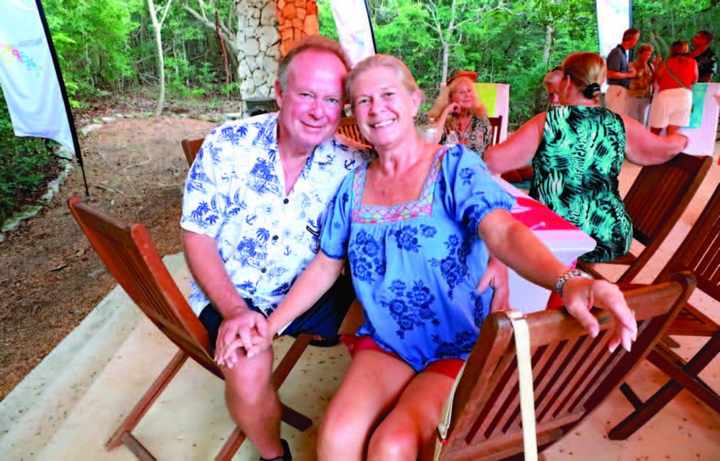 Larry and Joy Stovich, originally from Texas, now turned Eleutheran, as full-time residents in Palmetto Point, enjoy the social scene at the reception.