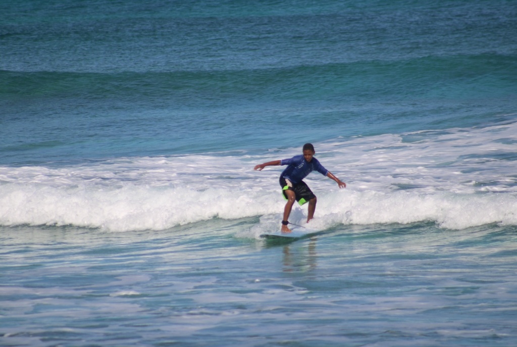 Isaiah Thompson of Gregory Town scores a good ride at an Eleuthera Surf Club session at Surfer's Beach.