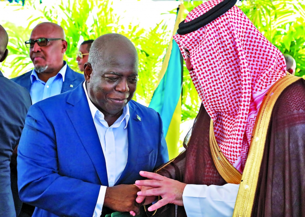 Prime Minister and Minister of Finance, the Hon. Philip Davis (left), greets His Excellency Sultan Abdulrah- man Al-marshad, Chief Executive Officer, Saudi Fund for Development (right), during the signing ceremony for a $55 million loan agreement to fund the redevelopment of the North Eleuthera International Airport.