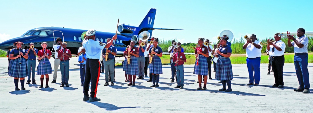 The Eleuthera Music Masters marching band, with a mix of students from high schools throughout Eleuthera, performing during the loan agreement signing ceremony on the tarmac of the North Eleuthera International Airport, on Monday, September 9th, 2024.