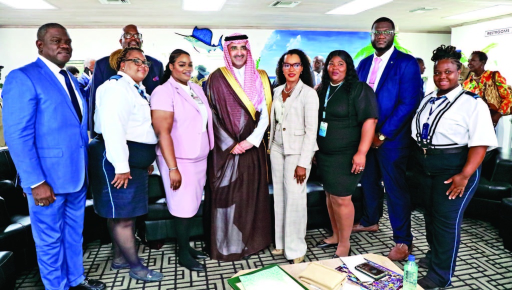 Officials and personnel from the Airport Authority, both local and national offices, stand with His Excellency Sultan Abdulrahman Al-marshad, Chief Executive Officer, Saudi Fund for Development (center).