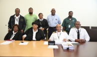 CONSUMERS REMINDED OF REGULATIONS – Consumers were reminded that personal importation of meat is limited to 50 pounds during a joint press conference between the Departments of Agriculture, Environmental Health and Customs. Shown from left are: Celestine Cox, Superintendent; Marsha Stubbs, Chief Customs Officer; Gregory Jones, Customs Revenue Superintendent; and Larry Bodie, Superintendent. Shown standing are: Gregory Jones, Customs Revenue; Michael Flowers, Department of Agriculture; Deborah Bootle, Chief Customs Revenue Officer; Dennis Cowan, Senior Health Inspector, Department of Environmental Health; and Eric Bastian, Department of Agriculture. (BIS Photo/Lisa Davis)