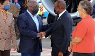 Bahamas DPM I. Chester Cooper greets PM Philip Davis on his return to the country on Friday, November 5th, 2021.