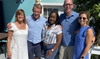 Eldecia (center) pictured with Island School Founders Chris and Pam Maxey, CEO/Head of School Ben Dougherty and spouse Laura.