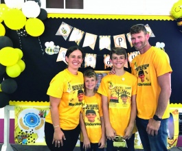 Wes Underwood with his mother, Natalie Underwood, his father, Yancy Underwood, and very proud sibling, during 'Wes Day' celebrations at SGPAAS.