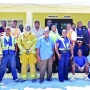 Standing for a group photo are the volunteers, employees, managers, emergency service personnel, as well as several residents caught in the action during the morning exercise at the Governor's Harbour airport on April 27th, 2023.